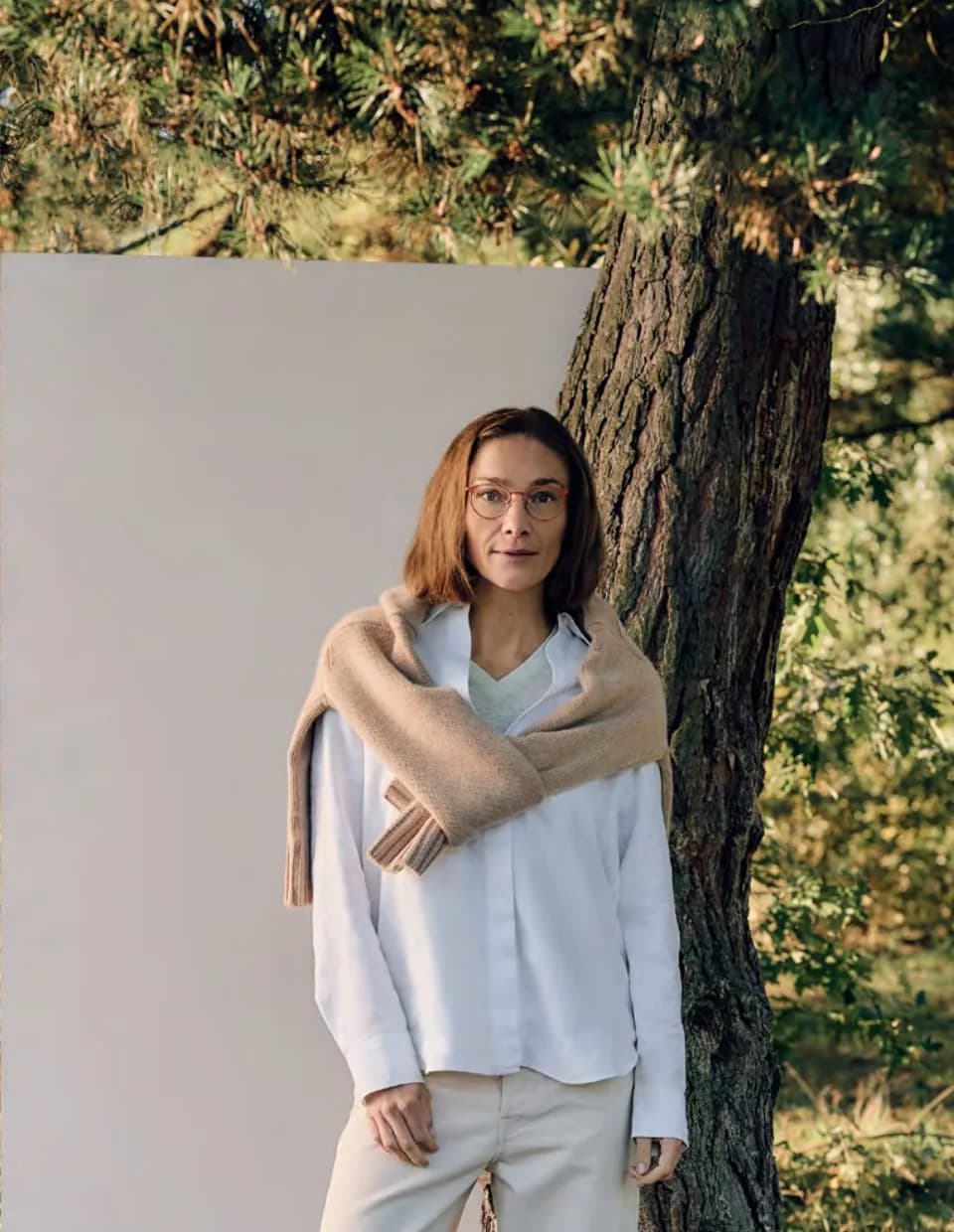 Jos. Eschenbach SS26 optical campaign image with a model by a tree