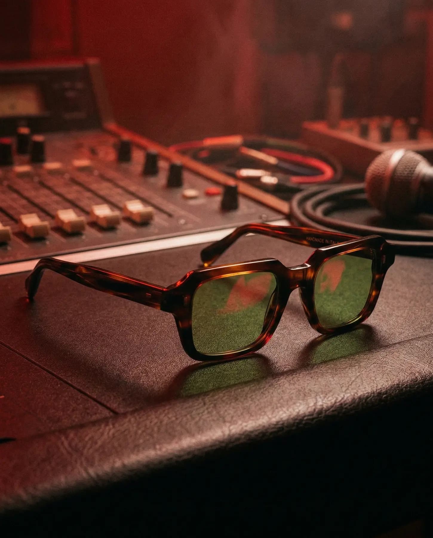 L.G.R studio still-life image with eyewear in warm red light