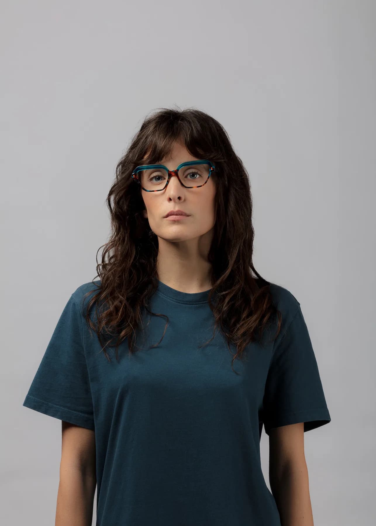 Mad in Italy WORN optical campaign image with a woman wearing a dark frame