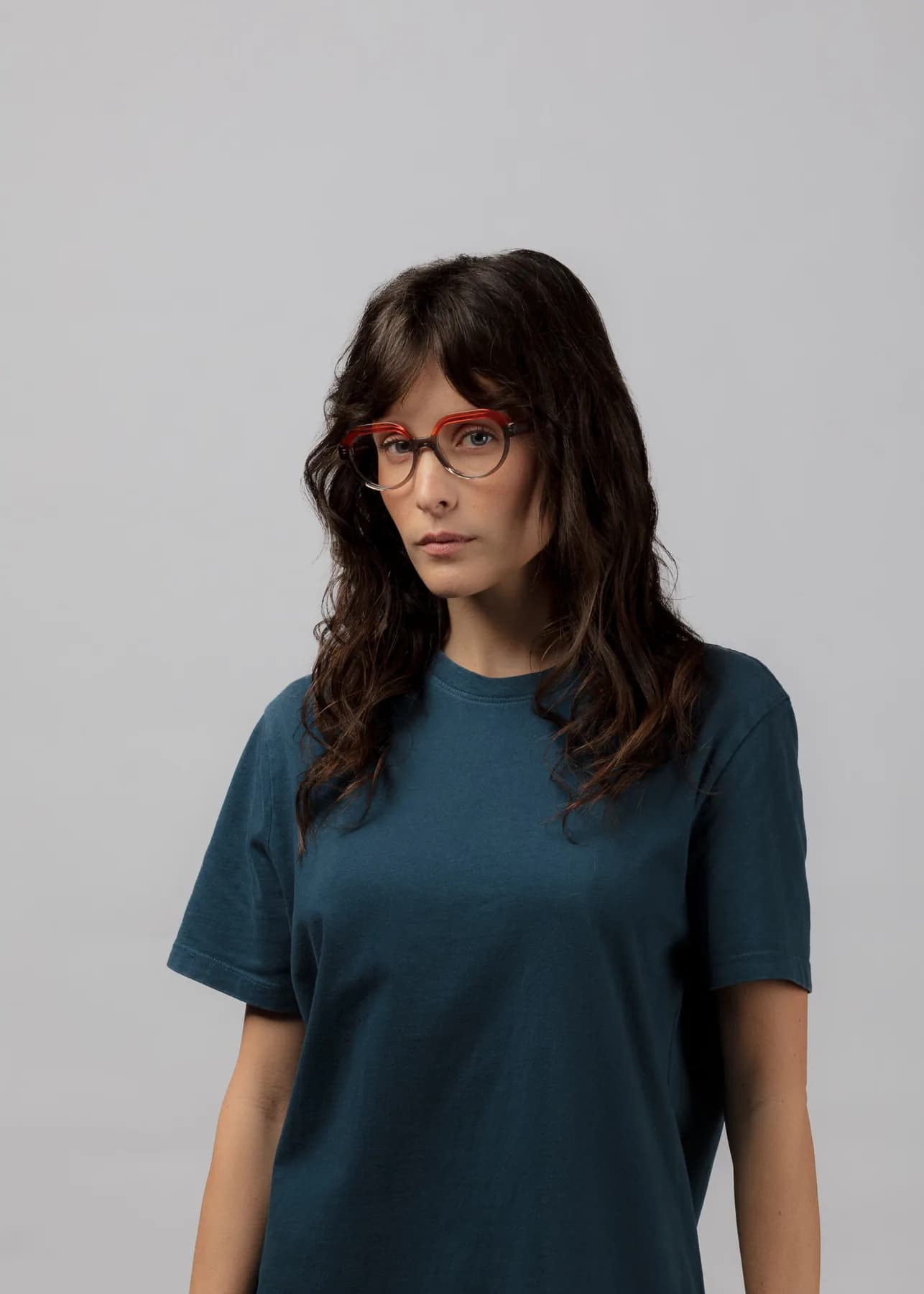 Mad in Italy WORN optical campaign image with a woman wearing a red frame