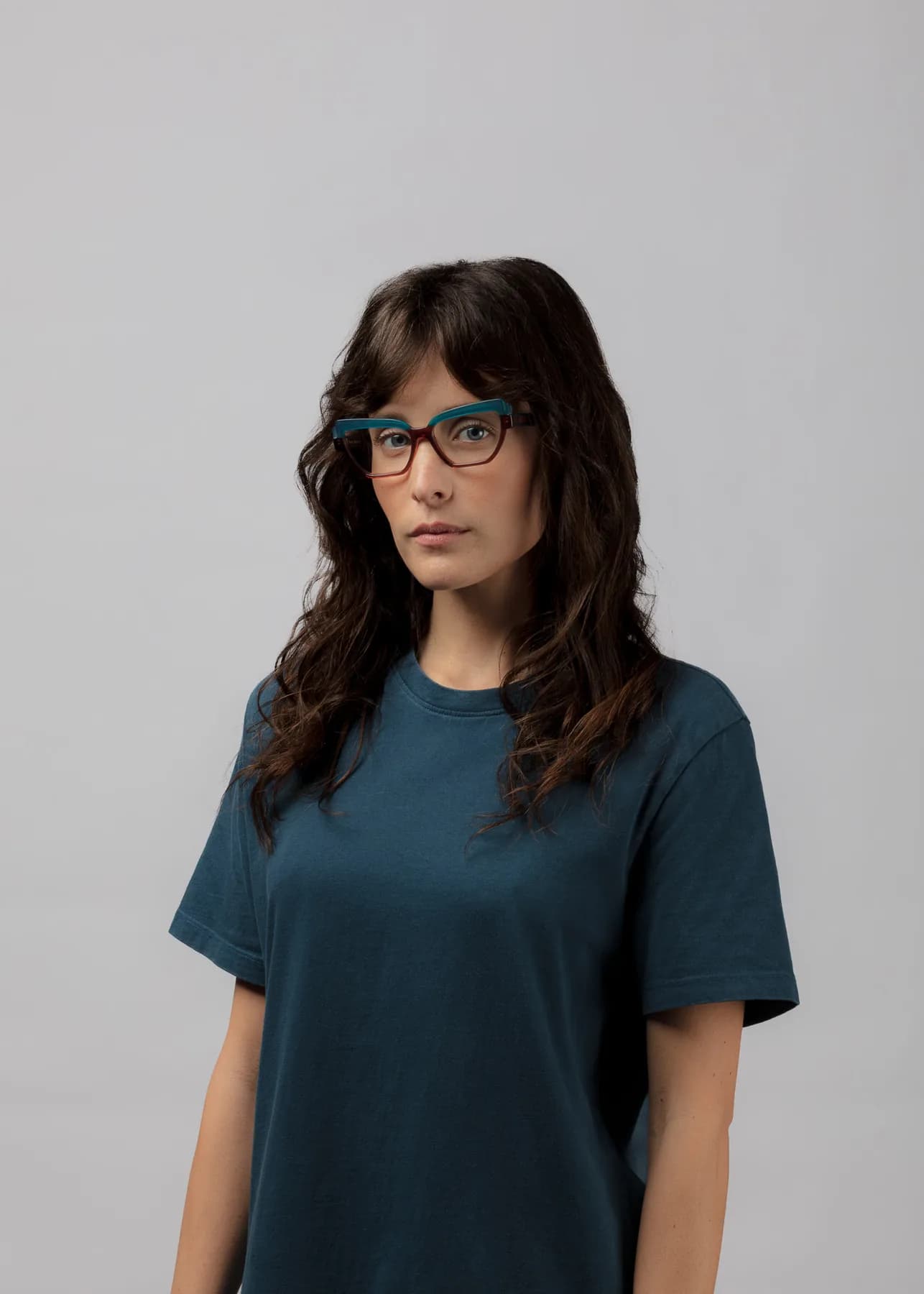 Mad in Italy WORN optical campaign image with a woman wearing a teal frame
