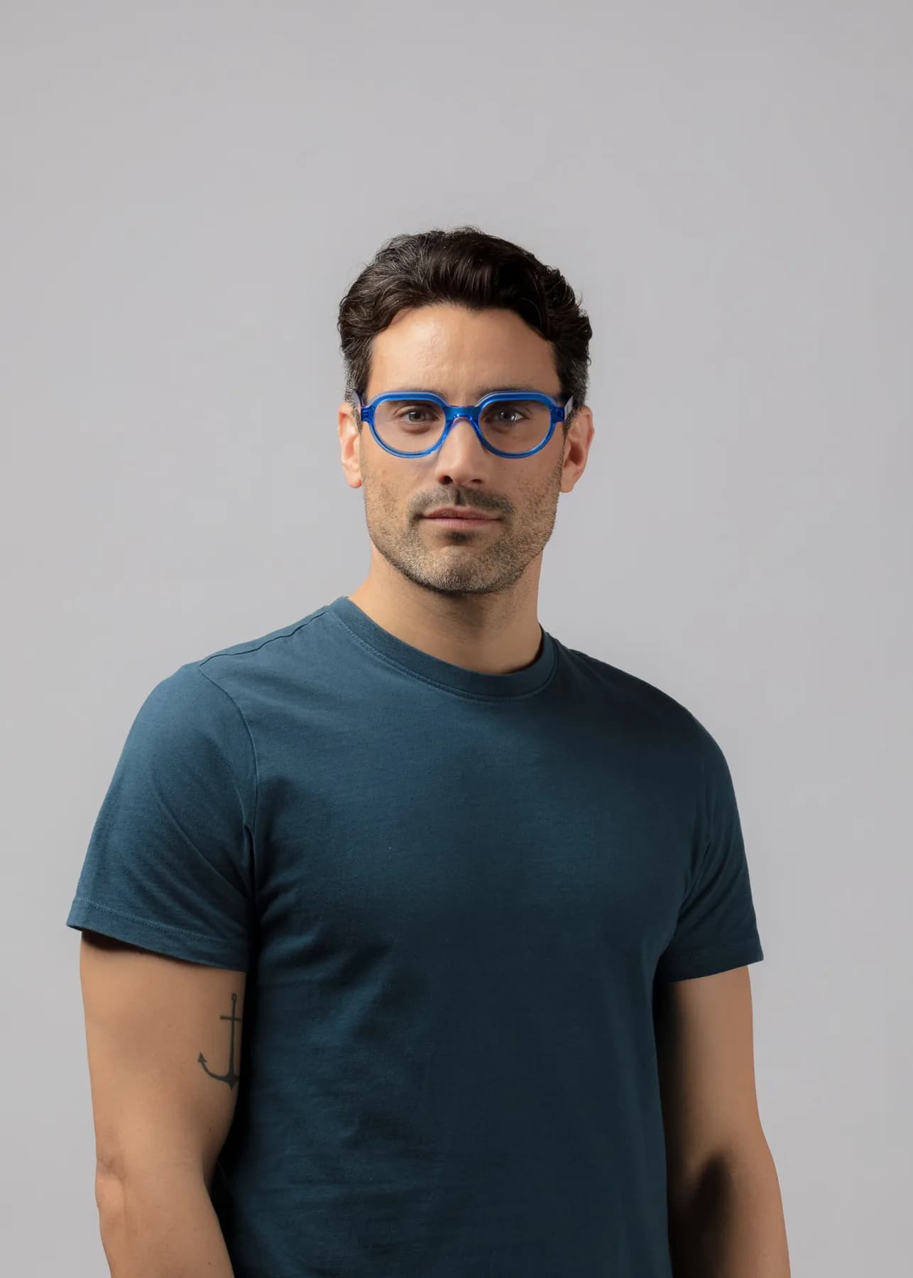 Mad in Italy WORN optical campaign image with a man wearing a green frame