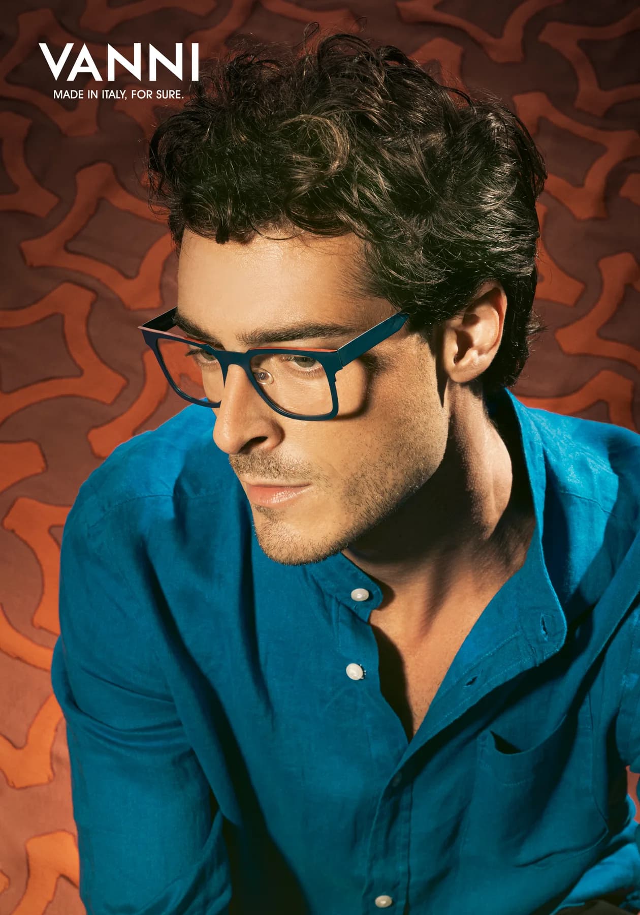 VANNI Fall/Winter 2025 optical campaign portrait with a male model wearing a blue frame