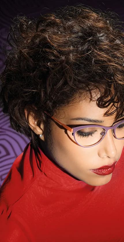 Vanni S/S 2026 optical campaign portrait with a model wearing a purple frame