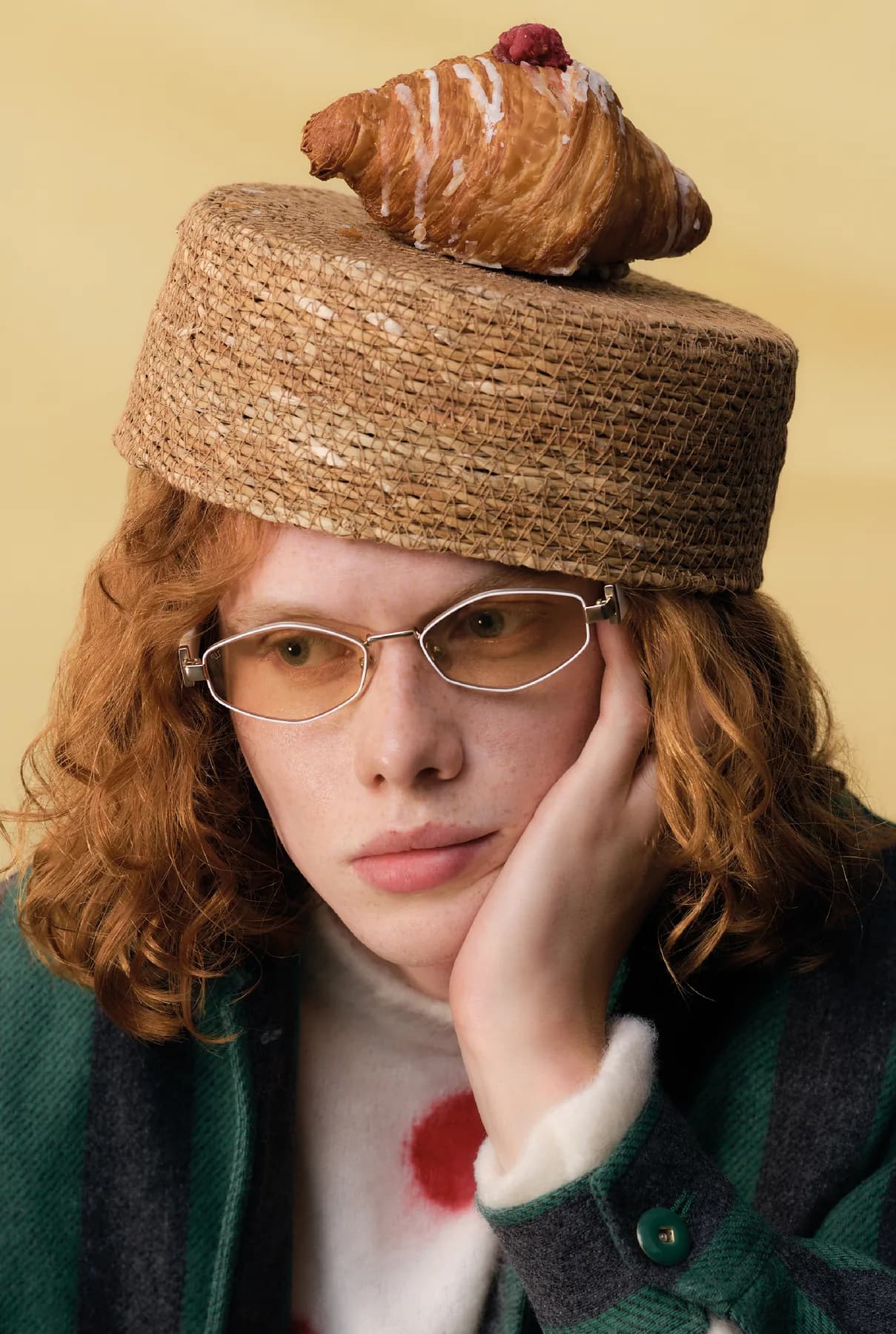 Woodys Unique Bakery SS26 optical campaign image with a model wearing a light frame